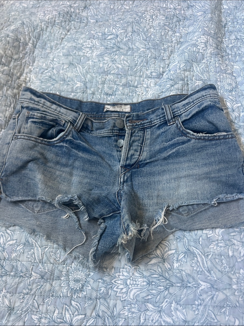 Free People Distressed Light Blue Denim button fly Jean Shorts 26 shark hem